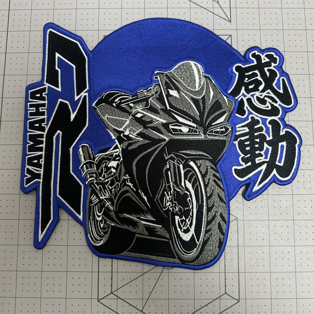 Large custom embroidered motorcycle patch in blue and black