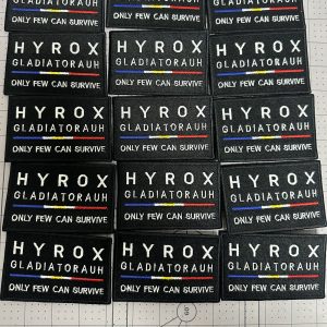 Rows of custom embroidered rectangular event patches