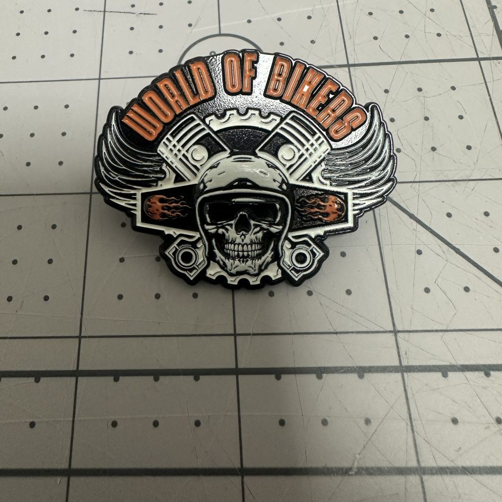 Custom die-struck enamel pin with black nickel plating