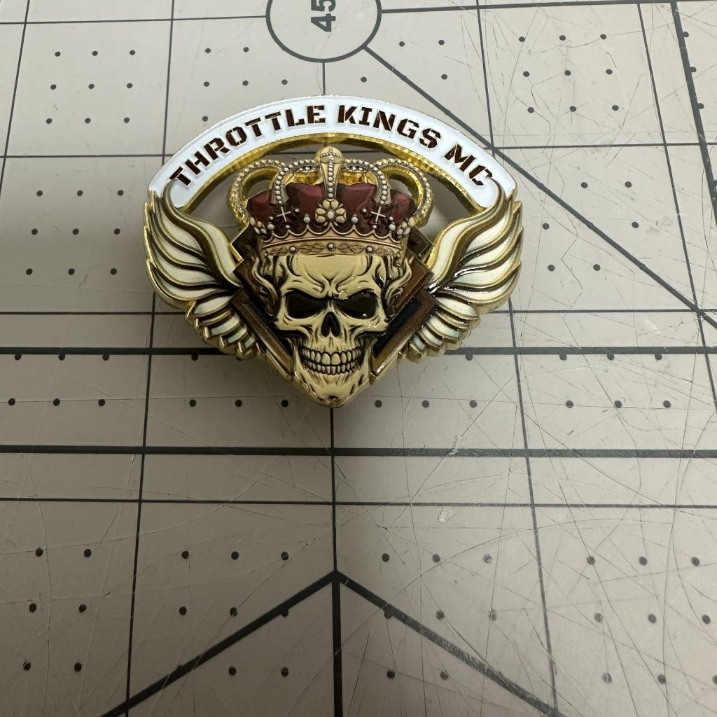 Custom hard enamel pin with antique gold plating and crown detail