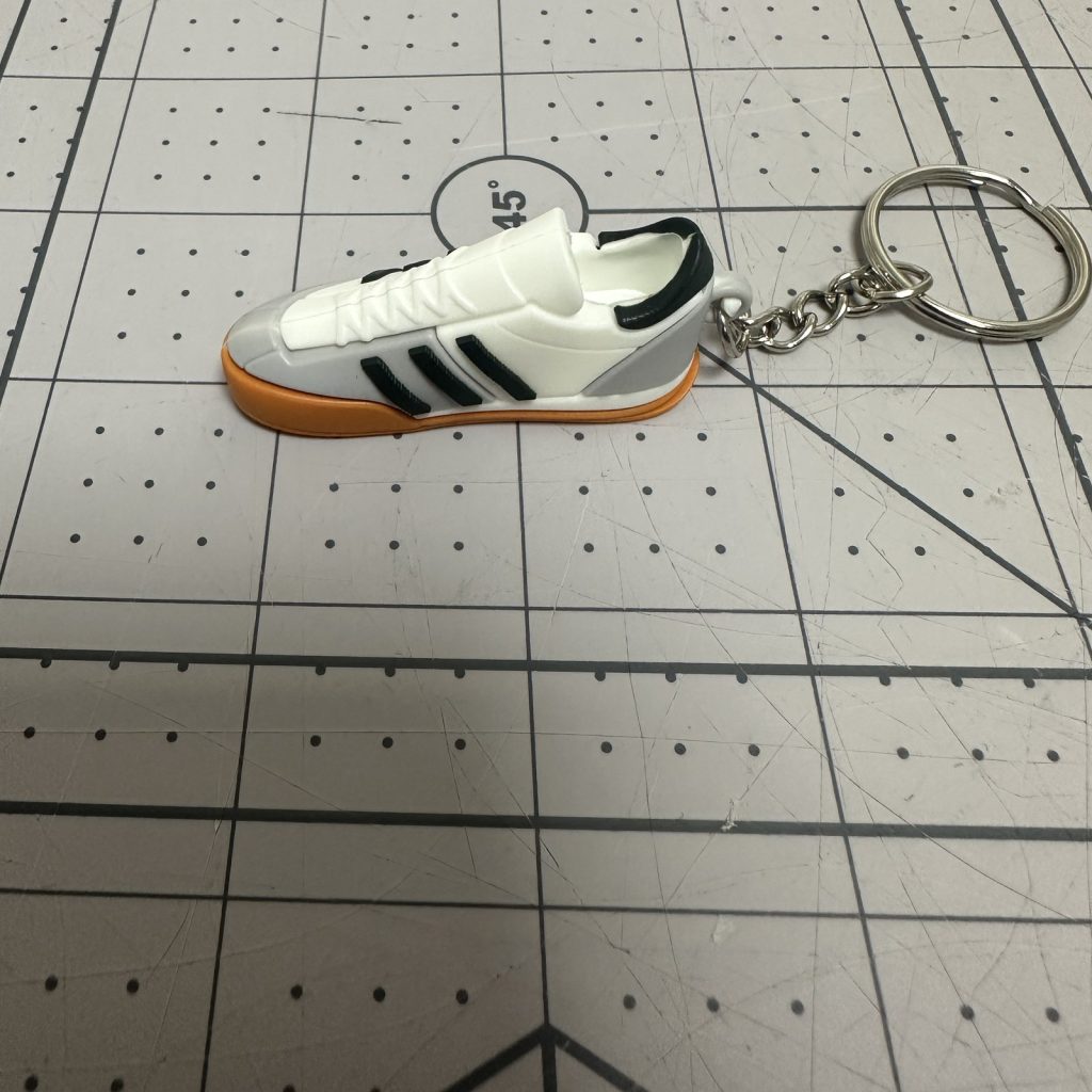 Custom 3D moulded PVC trainer keychain with split ring