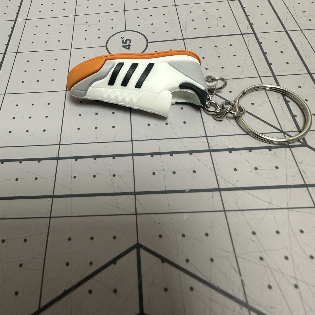 Custom 3D PVC keychain shown from the side