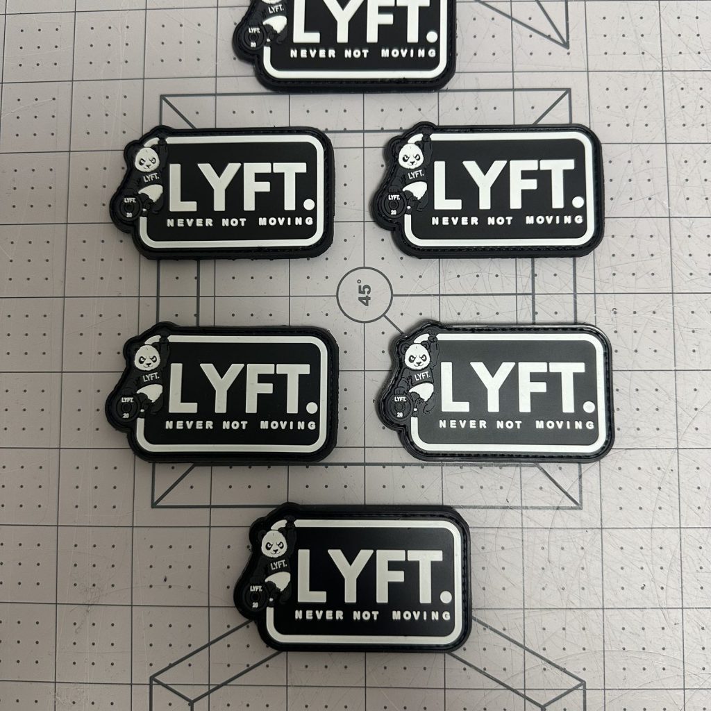 Custom die-cut PVC logo patches in black